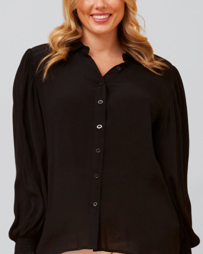 Front of a model wearing a size XL Cindy Shirt Long Puffy Fitted Sleeves Solid in Black by ANNICK. | dia_product_style_image_id:352486